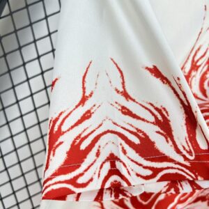 Camiseta Japón 2025/26 Local Y3 Flame Edition - detalle escudo JFA