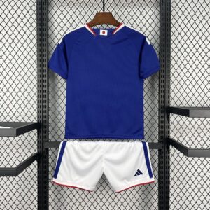 Camiseta Japón 2026 Local Niño - detalle escudo