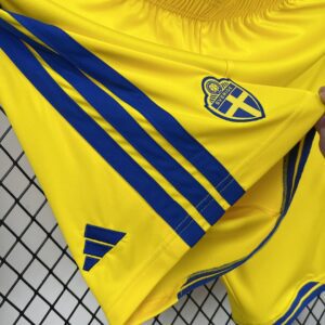 Shorts Suecia Mundial 2026 Local - detalle de la cintura elástica y cordón