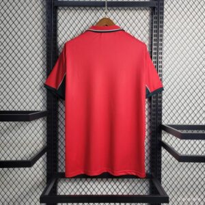 Camiseta Marruecos Mundial 2026 Local - detalle cuello y logo Puma