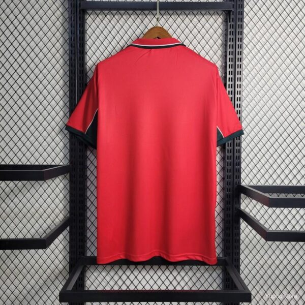 Camiseta Marruecos Mundial 2026 Local - detalle cuello y logo Puma