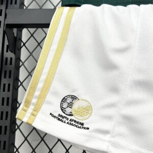 Camiseta Sudáfrica 2026 Visita Niño - detalle hombro y cuello