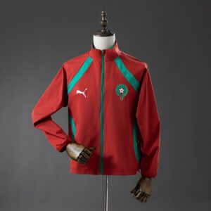 Cortavientos Marruecos 2026 Reversible Rojo y Verde - detalle escudo