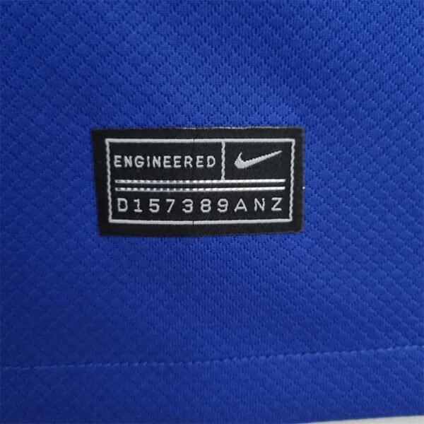 Camiseta Chelsea 2022/23 Local Mujer - detalle escudo y tela