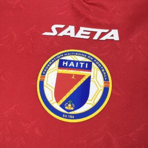 Camiseta Haití 2026 Local - detalle estampado frontal