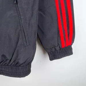 Camiseta River Plate 23-24 Reversible - detalle franjas manga derecha