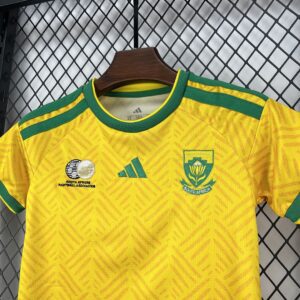 Camiseta Sudáfrica 2026 Local Niño - detalle cuello y hombro