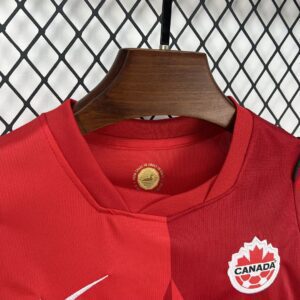 Camiseta Canada 2026 Local Niño - detalle lateral pantaloneta