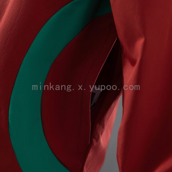 Cortavientos Marruecos 2026 Reversible Rojo y Verde - detalle