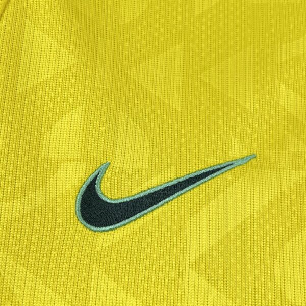 Camiseta Brasil Mundial 2026 Local Niño - dobladillo inferior