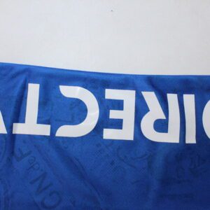 Camiseta Nacional de Montevideo 2024/25 Local - detalle logo Umbro y patrocinador BBVA
