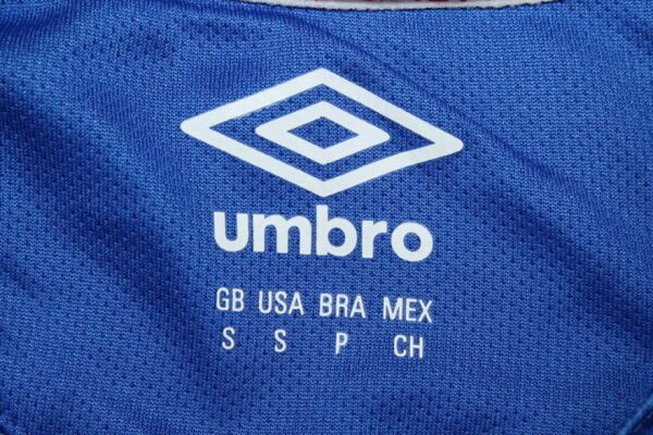 Camiseta Nacional de Montevideo 2024/25 Local - detalle puño y colores